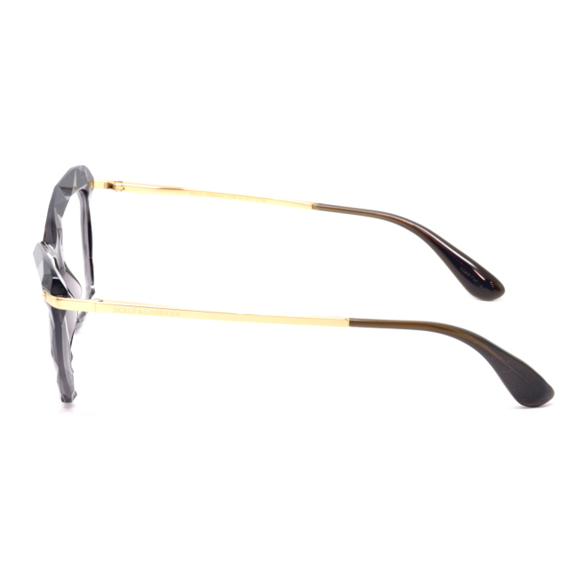 Dolce & Gabbana DG 5025 col. 504 è una montatura da vista da donna in acetato grigia trasparente, dalla forma cat eye e calibro 53.