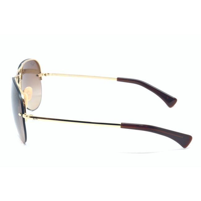 Ray-Ban RB 3449 col. 001/13 è un occhiale da sole in metallo oro e calibro 59.