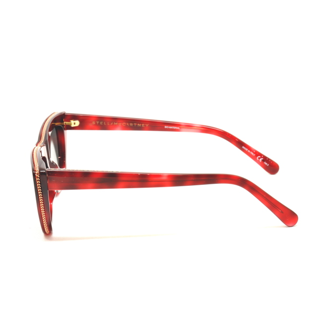 Stella McCartney SC 0188 S col. 003 è un occhiale da sole in acetato tartarugato rosso e calibro 52.