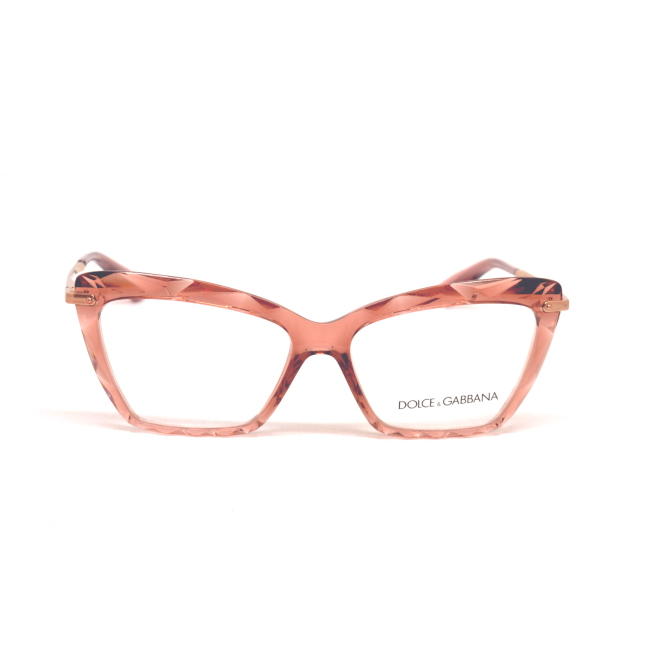 Dolce & Gabbana DG 5025 col. 3148 è una montatura da vista da donna in acetato rosa trasparente, dalla forma cat eye e calibro 53.