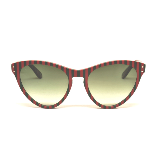 Gucci GG 0569 S col. 005 è un occhiale da sole in acetato rosso con righe verdi e calibro 54.