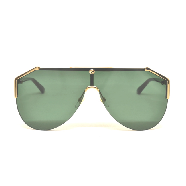 Gucci GG 0584 S col. 002 è un occhiale da sole in metallo oro.