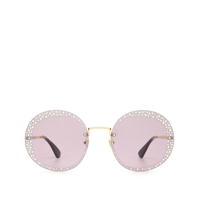 Gucci GG 0899-S col. 001 è un occhiale da sole in metallo oro e calibro 61.
