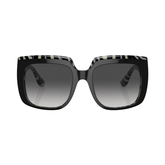 Dolce & Gabbana DG 4414 col. 3372/8G è un occhiale da sole da donna in acetato zebra e nero lucido, dalla forma squadrata e calibro 54.