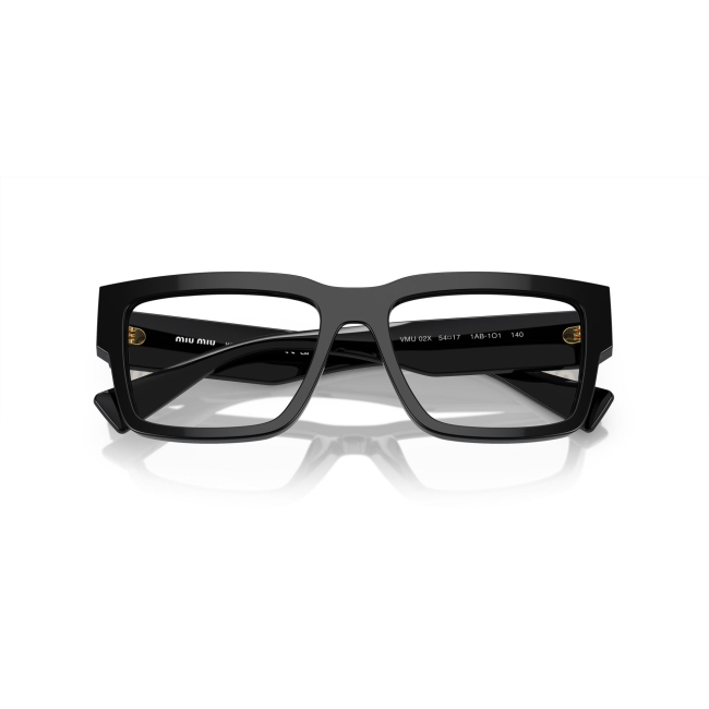 Miu Miu VMU 02X col. 1AB-1O1 è una montatura da vista da donna in acetato nero lucido, dalla forma rettangolare e calibro 54.