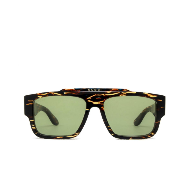 Gucci GG 1460 S col. 002 è un occhiale da sole in acetato marrone tartarugato e trasparente e calibro 56.