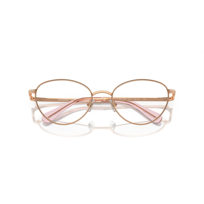 Swarovski SK 1002 col. 4014 è una montatura da vista da donna in metallo oro rosa, dalla forma ovale e calibro 51.
