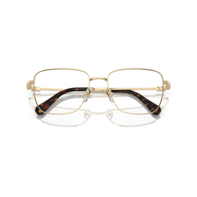 Swarovski SK 1003 col. 4013 è una montatura da vista da donna in metallo oro, dalla forma rettangolare e calibro 53.