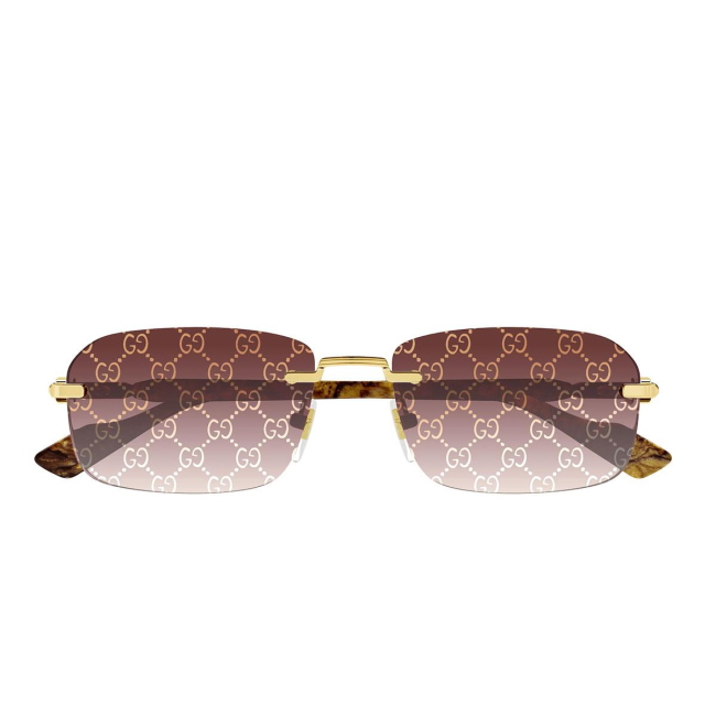 Gucci GG 1221 S col. 004 è un occhiale da sole da uomo in metallo oro e celluloide marrone tartarugato e calibro 56.