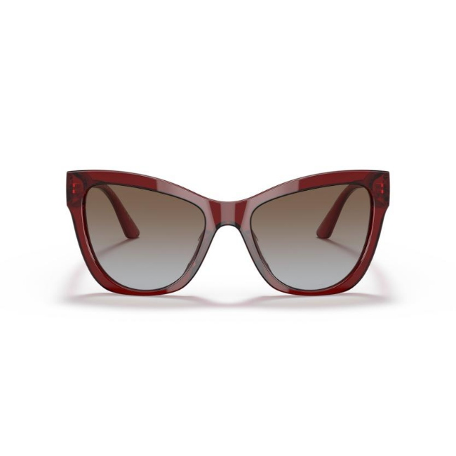 Versace VE 4417-U col. 388/89 è un occhiale da sole in acetato rosso trasparente e calibro 56.