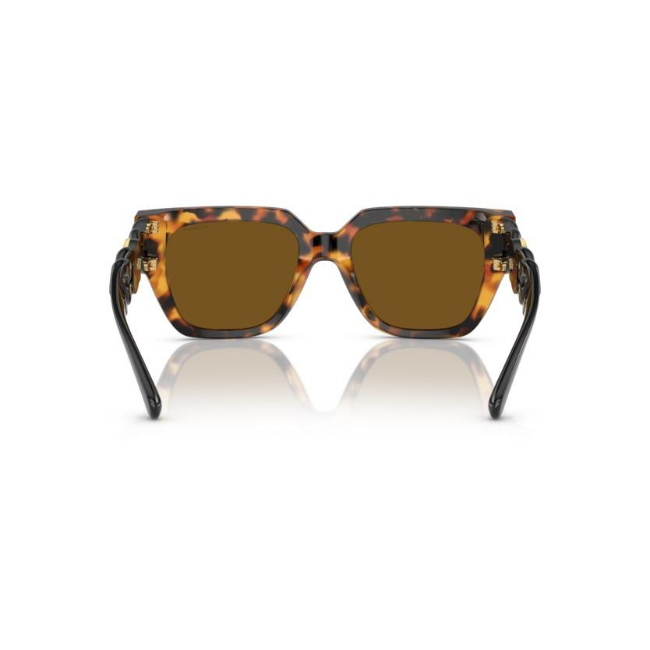 VERSACE VE4409 col. 511983 è un occhiale da sole in acetato e calibro 53.