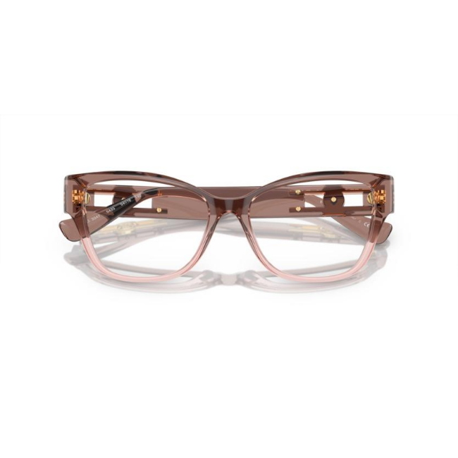 Versace VE 3347 col. 5435 è una montatura da vista da donna in acetato rosa trasparente, dalla forma pillow e calibro 54.