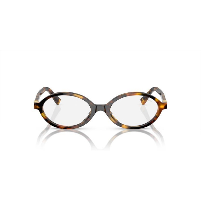 Miu Miu SMU 04Z col. VAU-08N è un occhiale da sole da donna in acetato marrone tartarugato, dalla forma ovale e calibro 50.