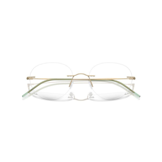 Giorgio Armani AR 5147 col. 3002 è una montatura da vista in metallo oro pallido opaco e calibro 52.