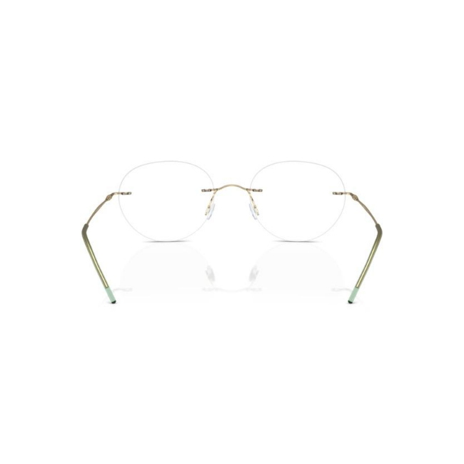 Giorgio Armani AR 5147 col. 3002 è una montatura da vista in metallo oro pallido opaco e calibro 52.