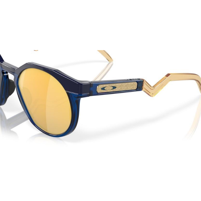 Oakley OO 9242 HSTN KYLIAN MBAPPE' SIGNATURE SERIES col. 11 è un occhiale da sole in acetato blu navy e blu trasparente e calibro 52.