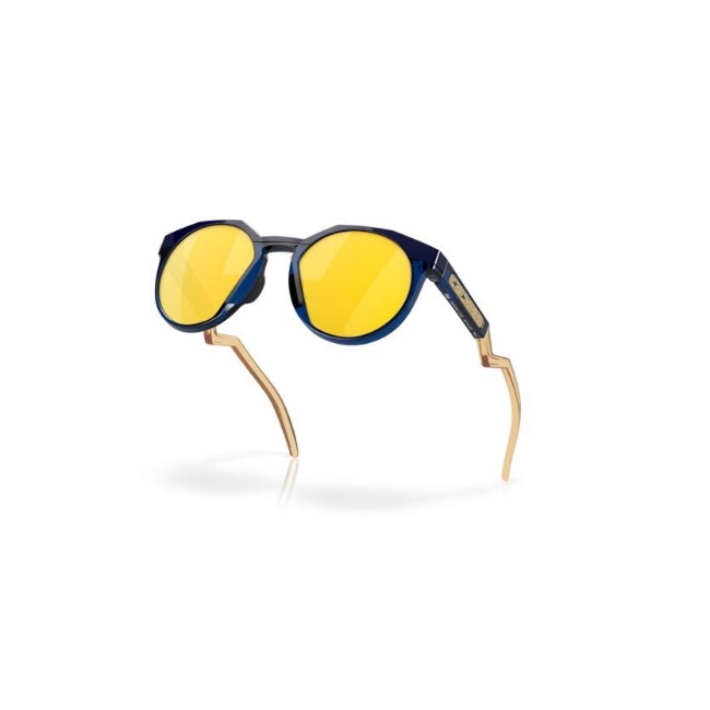 Oakley OO 9242 HSTN KYLIAN MBAPPE' SIGNATURE SERIES col. 11 è un occhiale da sole in acetato blu navy e blu trasparente e calibro 52.