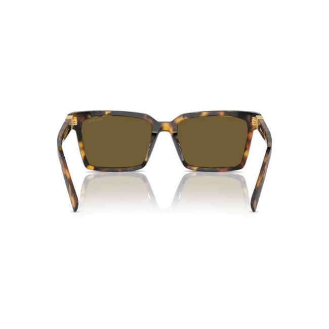 Miu Miu SMU 13Z col. VAU-01T è un occhiale da sole in acetato marrone tartarugato e calibro 55.