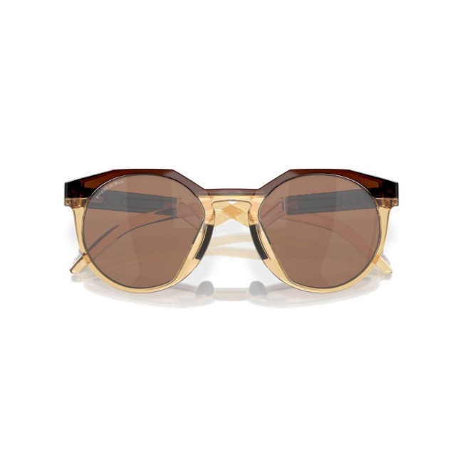 Oakley OO 9242 HSTN KYLIAN MBAPPE' SIGNATURE SERIES col. 07 è un occhiale da sole in ambra scuro/giallo curry chiaro e calibro 52.