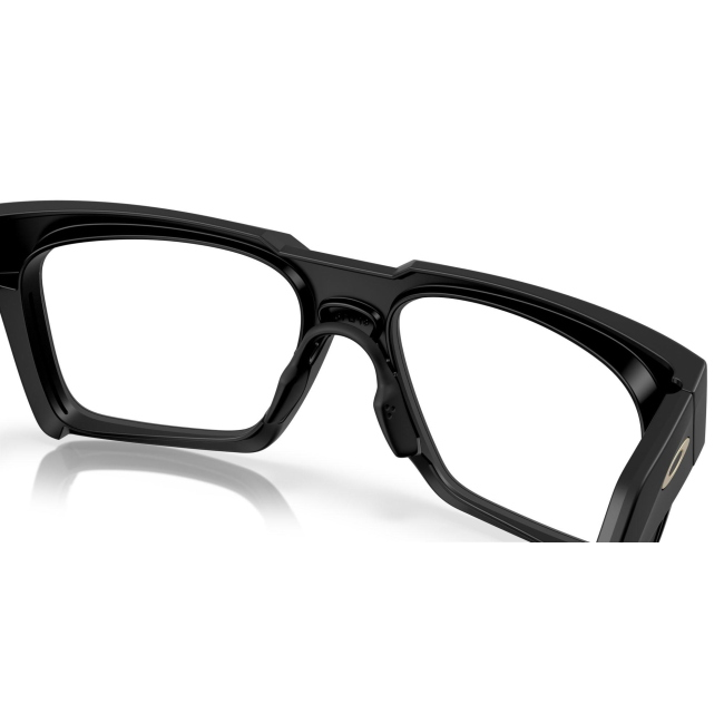 Oakley OX 8190 ENIGMA INK col. 01 è una montatura da vista in acetato nero satinato e calibro 55.