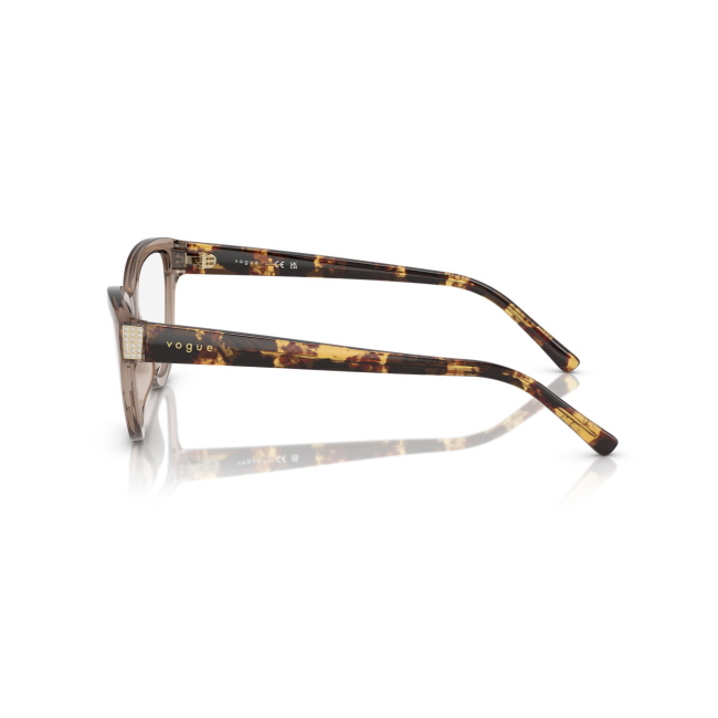 Vogue VO 5610-B col. 2940 è una montatura da vista in acetato marrone trasparente e calibro 54.