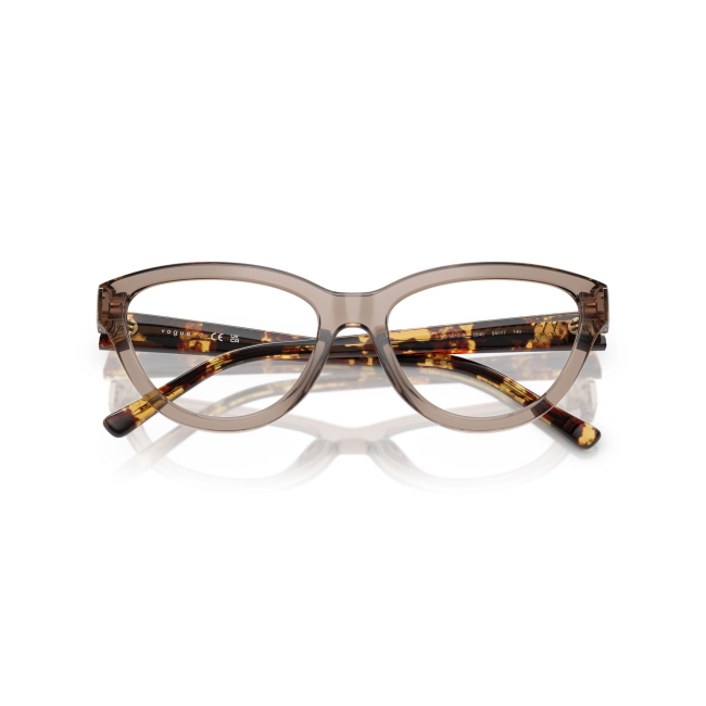 Vogue VO 5610-B col. 2940 è una montatura da vista in acetato marrone trasparente e calibro 54.