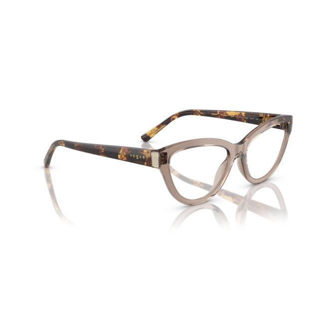 Vogue VO 5610-B col. 2940 è una montatura da vista in acetato marrone trasparente e calibro 54.