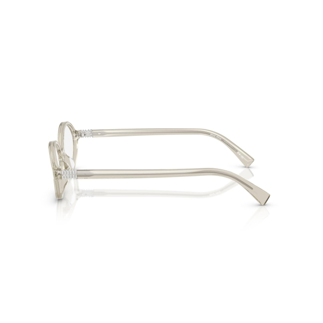 Miu Miu VMU 01X col. 12U-1O1 è una montatura da vista da donna in acetato canapa trasparente, dalla forma ovale e calibro 50.