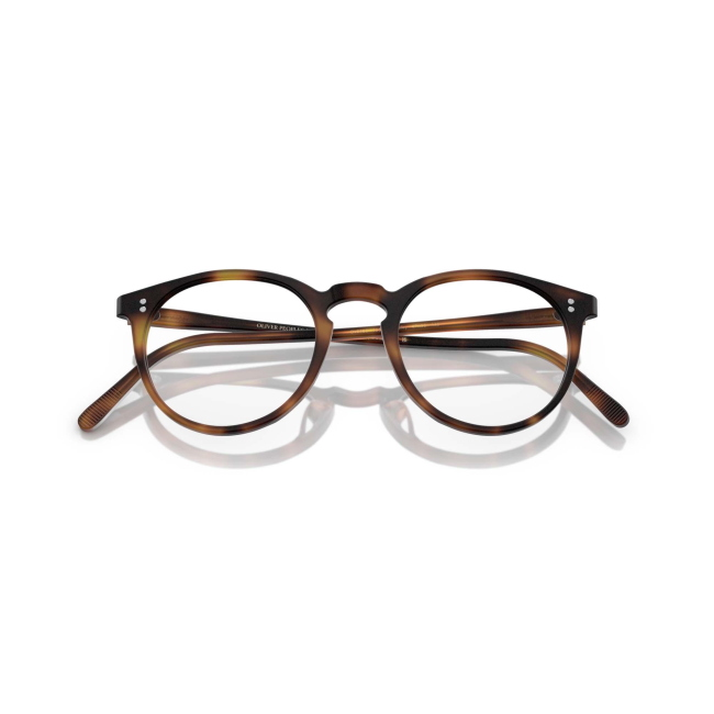Oliver Peoples OV 5183 O'MALLEY col. 1552 è una montatura da vista da uomo in acetato marrone tartarugato, dalla forma pantos e calibro 45.