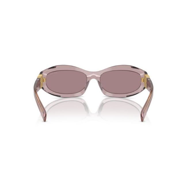 Miu Miu SMU 14Z col. 12W-20I è un occhiale da sole da donna in acetato rosa trasparente, dalla forma irregolare e calibro 59.