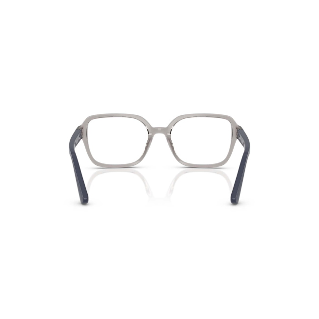 Vogue Kids VY 2032 col. 2726 è una montatura da vista in acetato grigio trasparente e blu scuro e calibro 47.