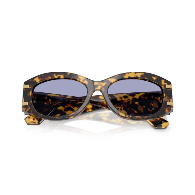Dolce & Gabbana DG 4502 col. 3330/1A è un occhiale da sole da donna in acetato tartarugato giallo, dalla forma ovale e calibro 55.