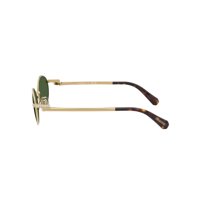 Swarovski SK 7033 col. 4004/71 è un occhiale da sole da donna in metallo oro, dalla forma ovale e calibro 53.