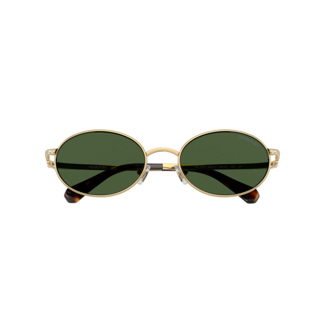 Swarovski SK 7033 col. 4004/71 è un occhiale da sole da donna in metallo oro, dalla forma ovale e calibro 53.