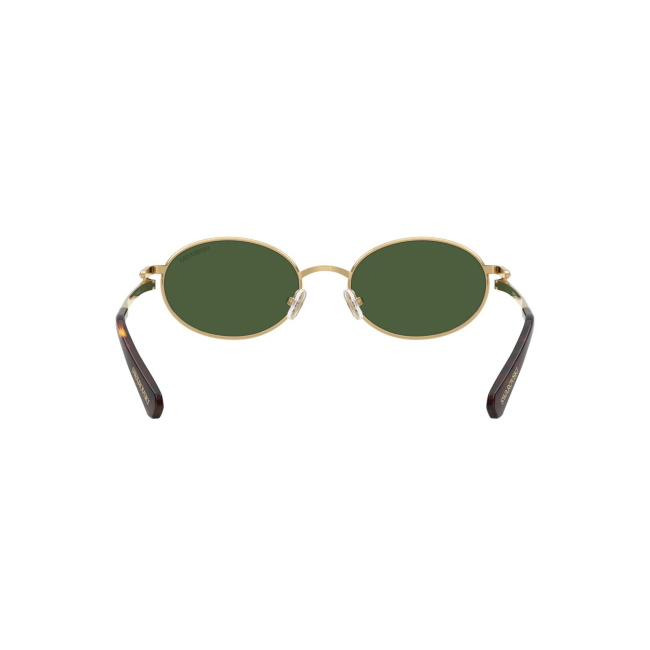 Swarovski SK 7033 col. 4004/71 è un occhiale da sole da donna in metallo oro, dalla forma ovale e calibro 53.