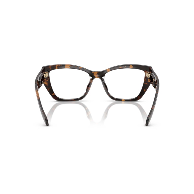 MICHAEL KORS MK 4149U PUGLIA col. 3006 è una montatura da vista da donna in acetato marrone tartarugato, dalla forma squadrata e calibro 54.