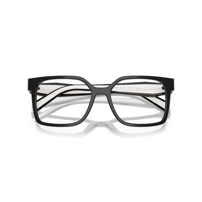 Prada VPR B03 col. 16K-1O1 è una montatura da vista da donna in acetato nero e bianco, dalla forma rettangolare e calibro 54.
