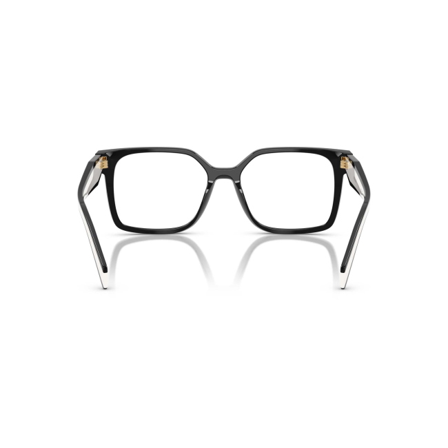 Prada VPR B03 col. 16K-1O1 è una montatura da vista da donna in acetato nero e bianco, dalla forma rettangolare e calibro 54.