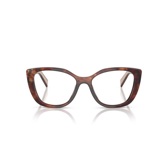Prada VPR B04 col. 07R-1O1 è una montatura da vista da donna in acetato caramello tartarugato e beige, dalla forma cat eye e calibro 53.