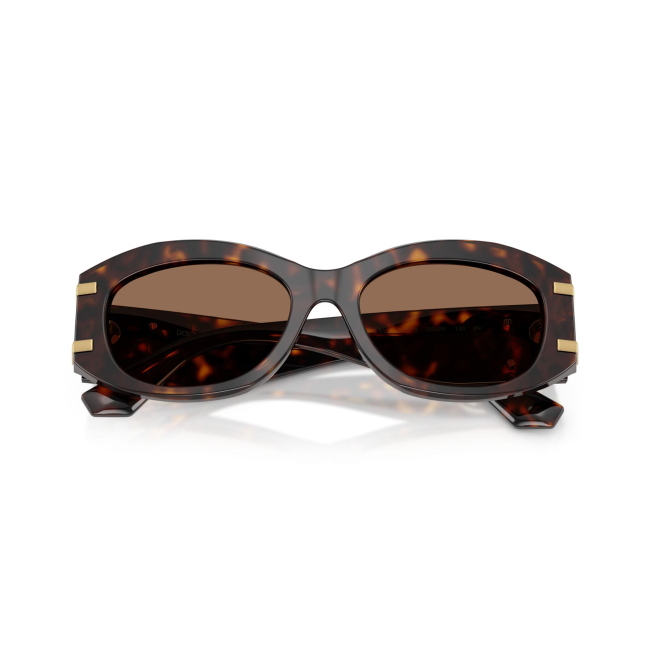 Dolce & Gabbana DG 4502 col. 502/73 è un occhiale da sole da donna in acetato marrone tartarugato, dalla forma ovale e calibro 55.