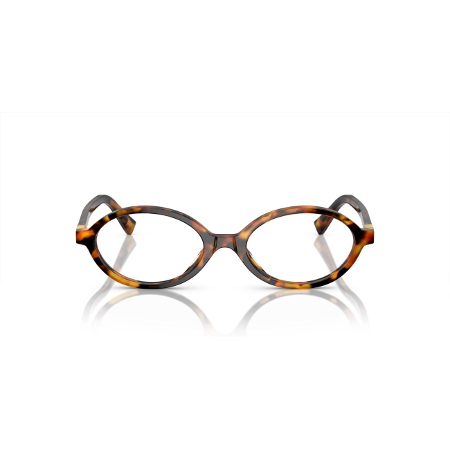Miu Miu VMU 01X col. 19P-1O1 è una montatura da vista da donna in acetato marrone tartarugato chiaro, dalla forma ovale e calibro 50.