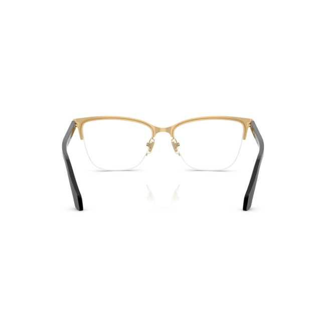 Versace VE 1304 col. 1002 è una montatura da vista da donna in metallo oro e celluloide nero, dalla forma cat eye e calibro 54.