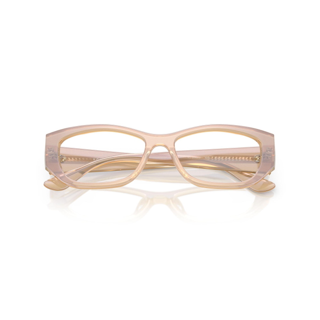 Vogue VO 5640U col. 3234 è una montatura da vista in acetato panna perlato trasparente e calibro 53.