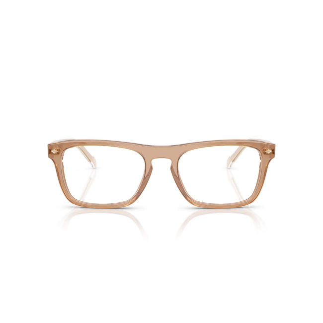 Vogue VO 5619 col. 3189 è una montatura da vista in acetato marrone trasparente e calibro 54.