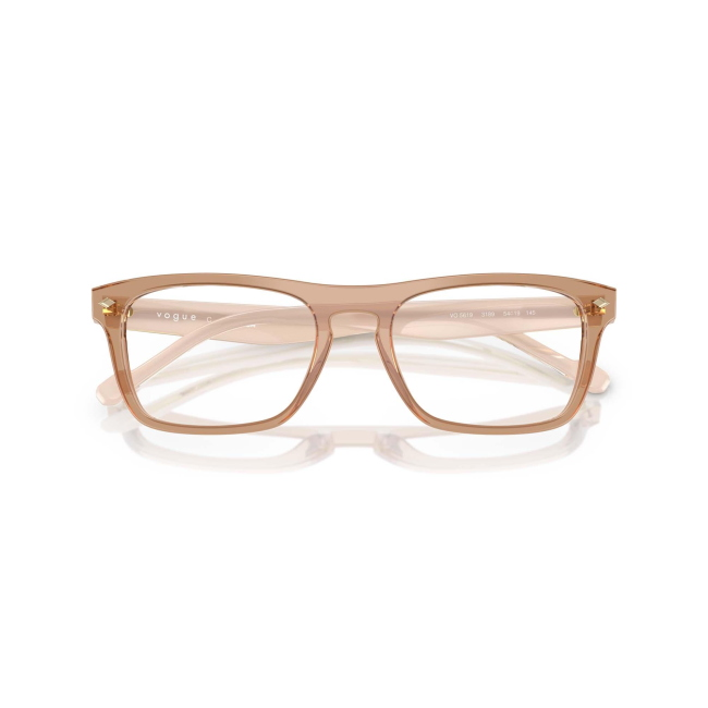 Vogue VO 5619 col. 3189 è una montatura da vista in acetato marrone trasparente e calibro 54.