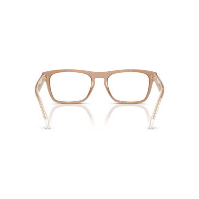 Vogue VO 5619 col. 3189 è una montatura da vista in acetato marrone trasparente e calibro 54.