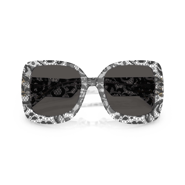 Dolce & Gabbana DG 4513 Col.3287/87 Cal.55: occhiale da sole, calibro 55, colore 3287/87. Materiale/finitura celluloide trasparente con pizzo nero interno, colore principale nero, lenti grigio scuro.