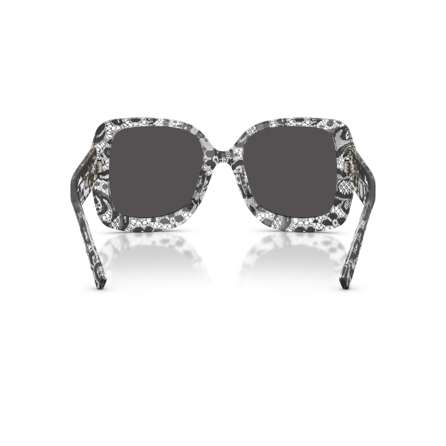 Dolce & Gabbana DG 4513 Col.3287/87 Cal.55: occhiale da sole, calibro 55, colore 3287/87. Materiale/finitura celluloide trasparente con pizzo nero interno, colore principale nero, lenti grigio scuro.