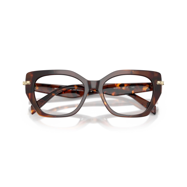 MICHAEL KORS MK 4167U NASHVILLE col. 4031 è una montatura da vista da donna in acetato marrone tartarugato, dalla forma irregolare e calibro 53.