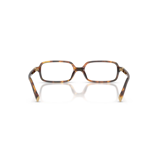 Miu Miu VMU 01Y col. 14L-1O1 è una montatura da vista da donna in acetato marrone tartarugato, dalla forma rettangolare e calibro 51.
